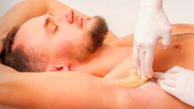  Man receiving affordable mens waxing treatment at Claremont Perth salon with professional waxing specialist